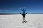 Jason & Aracely on the salt flats in Northern Argentina. Copyright Twobackpackers.com