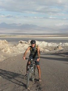 Marco biking in the Valle de Luna, Chile. Copyright ThinkingNomads.com