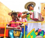 Big and colorful parade floats featuring a Vallenato band, music from around Cartagena. Copyright CareerBreakSecrets.com