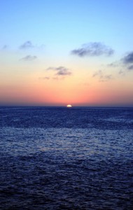 Sunset off the coast of Española Island, Galapagos. Copyright CareerBreakSecrets.com