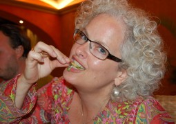 Janice Eating a Cricket. Copyright SoloTraveler.com
